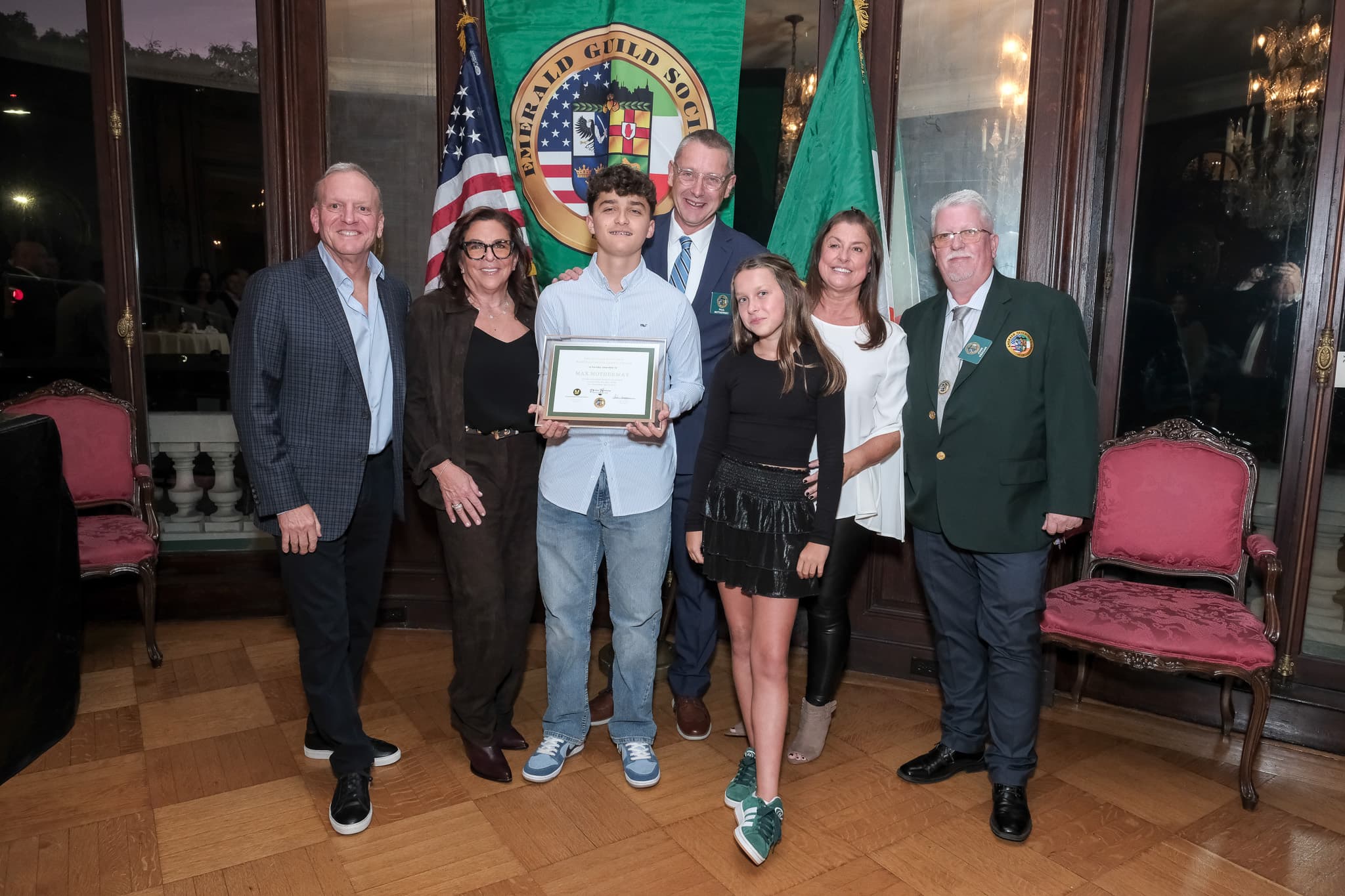 Emerald Guild Society members and scholarship recipients gathered at a Guild event.